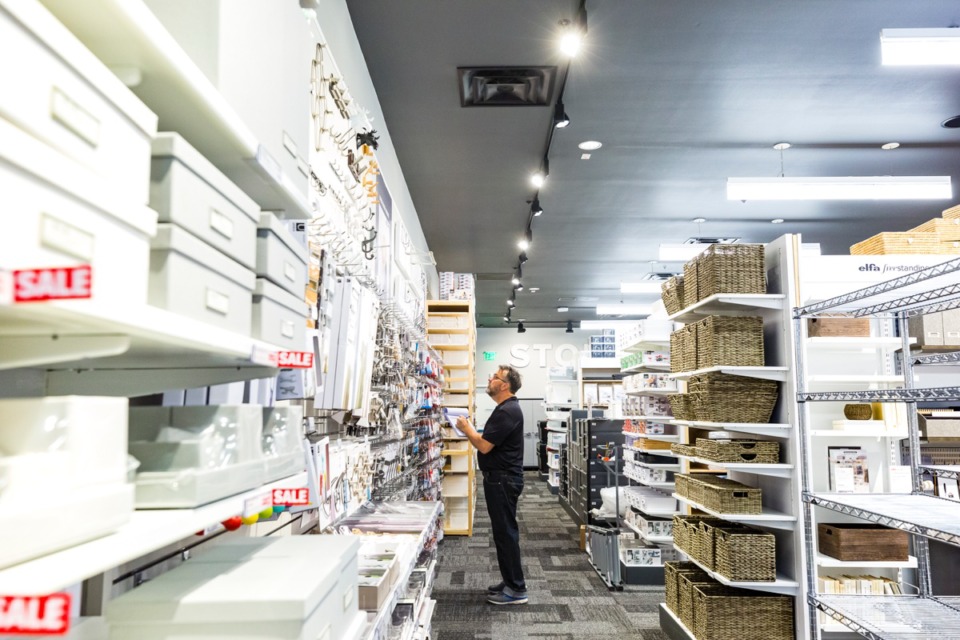 <strong>Bobby Campbell checks inventory inside the new Container Store in Germantown on Sept. 11. The store is set to open Saturday, Sept. 14.</strong> (Ziggy Mack/Daily Memphian)&nbsp;